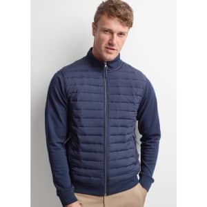 A men's tailored jacket in navy blue, featuring a zip closure and padded front design.
