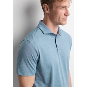 A men's short sleeve polo in a light blue colour with a collar and a logo on the chest.