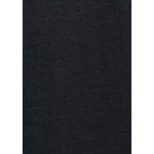 A long sleeve shirt in black, featuring a simple button-up design and a logo.