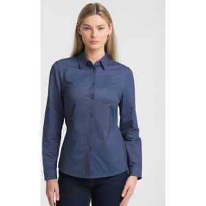 A long-sleeve women's shirt in navy blue featuring a collared neckline and button-up front, with a logo present.