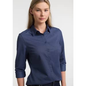 A navy long sleeve shirt for women featuring a button-up front and rolled sleeves, with a logo present.