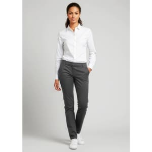 A woman is wearing grey Women's Lawson Chino Pants paired with a white shirt and white shoes. The image features a logo.