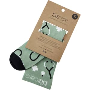 Unisex Happy Feet Comfort Socks in mint green with black accents and a design featuring hearts and plus signs.