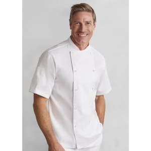 A white short sleeve chef jacket is worn by a smiling man. The jacket features buttons and a clean design.