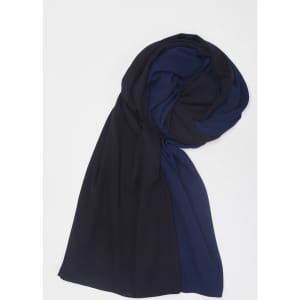 A women's hijab featuring a blend of black and navy blue fabric, elegantly draped.