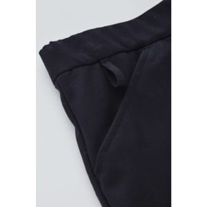 A close-up of a black women's comfort waist cargo skirt, highlighting the waistband and pocket details.