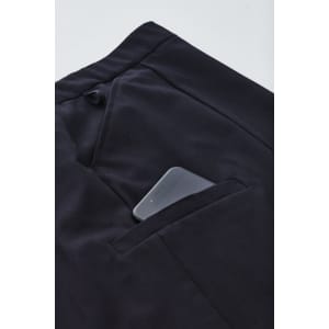 A black cargo skirt with a smartphone tucked into a side pocket. The fabric appears soft and comfortable.
