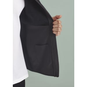 A black vest featuring a zip front and an interior pocket, showcasing a modern design and sleek style.
