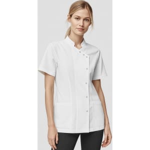 A white short-sleeve top with a mandarin collar, featuring a button closure and front pockets. It has a branding logo.