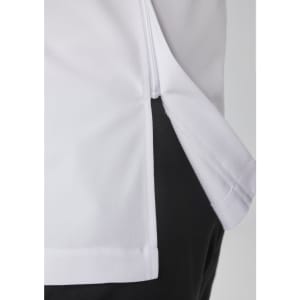 A close-up view of a white and black jacket, featuring a zip and side seam detail. The jacket has a logo.