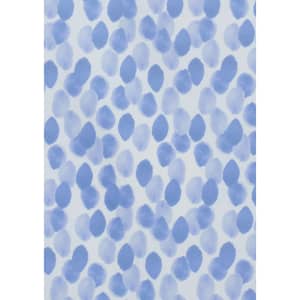 A blue and white tunic featuring a stardust print with abstract spot patterns. The design has a soft, watercolour effect.