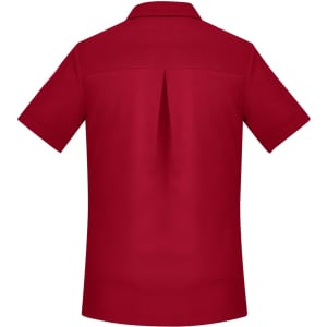 A red women's short sleeve shirt with a back pleat and a collar, featuring a logo.