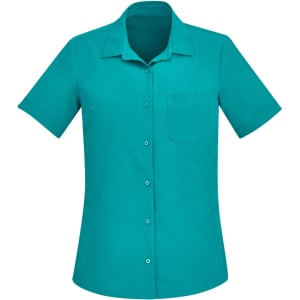 A plain short sleeve shirt in a vibrant teal colour, featuring a collar and a front pocket, with a logo.