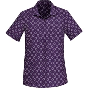 A short sleeve button-up shirt in purple featuring a daisy print pattern and a logo on the collar.