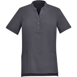 A dark grey women's tunic with a mandarin collar, short sleeves, and front pockets, featuring buttons and a logo.