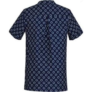 A navy tunic featuring a white daisy print, with a classic collar and short sleeves. It has a back yoke and a logo.