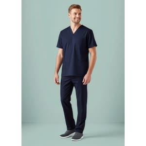 A navy scrub top and matching scrub pant; features a pocket and a logo on the chest.