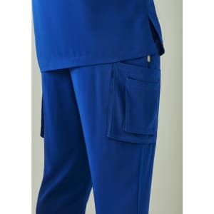 A pair of blue straight leg scrub pants featuring side pockets and a logo.