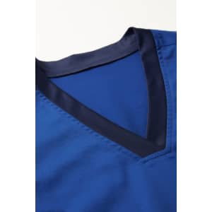 A blue scrub top with a V-neck design and contrasting navy blue trim. It features a smooth fabric texture.