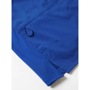 A blue women's scrub top featuring a side split and a drawstring detail. It has a logo on the fabric.