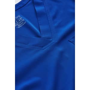 A V-neck scrub top in a vibrant blue colour, featuring a pocket and a logo.