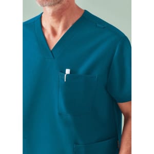 A unisex teal V-neck scrub top featuring a chest pocket, designed for comfort and functionality in medical settings.