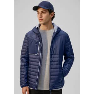 A unisex soft shell jacket in navy blue with a hood and a front zip pocket, worn by a model.