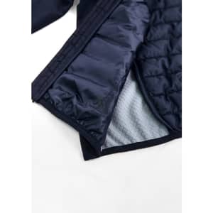 A unisex patrol jacket in navy blue, featuring a quilted lining and an interior texture pattern. It includes a logo.