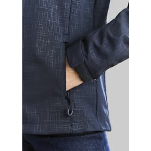 A soft shell jacket in navy with a geometric pattern and a zippered pocket. Features a snug cuff detail.