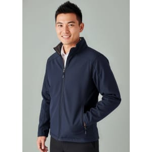 A navy soft shell jacket with a zip front, side pockets, and a collar, worn by a smiling male model.