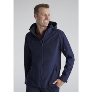 A man wearing a navy rain jacket with a hood, featuring a zipper and side pockets, and a logo on the sleeve.
