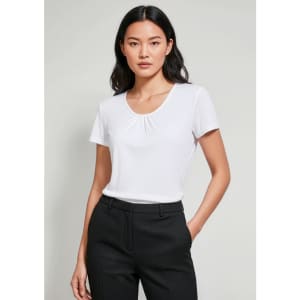 A women's chic top in white, featuring a scoop neckline and short sleeves, worn with tailored black trousers.
