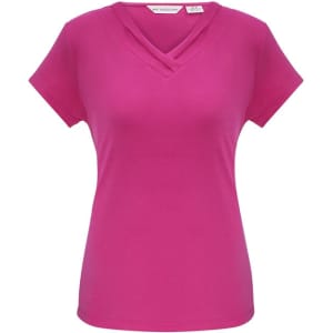 A pink short sleeve top with a V-neck design, featuring a subtle layered detail and a logo tag.