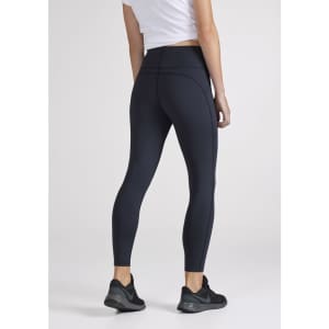 A pair of women's 7/8 length leggings in navy blue with a high waistband, featuring a logo.