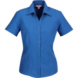 A blue women's button-up short sleeve shirt with a collared neckline and five buttons down the front.