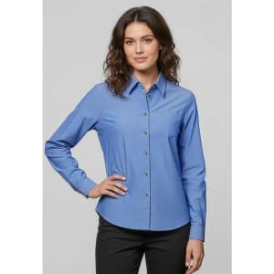 A women's long sleeve button-up shirt in light blue, featuring a collared neckline and a single pocket.