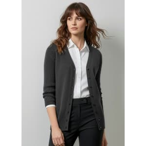 A grey women's Milano cardigan featuring a button-up front and ribbed detailing, worn over a white shirt and black pants.