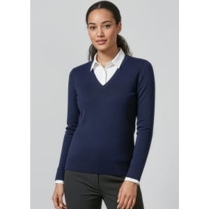 A women's navy V-neck knitted pullover worn over a white collared shirt, featuring a fitted design and long sleeves.