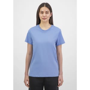 A women's short sleeve tee in a soft blue colour, featuring a crew neck and a fitted style. It has a logo on the sleeve.