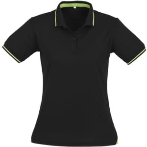 A women's black polo shirt featuring short sleeves and green accents. The shirt has a collar and branding.