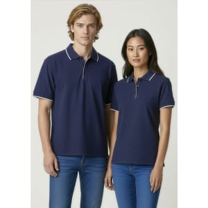 A navy blue women's polo shirt featuring short sleeves and a contrasting trim. The model is paired with a male model in a similar style.