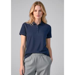 A navy blue women's short sleeve polo shirt with a logo, paired with grey athletic pants.