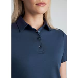 A navy blue women's polo shirt featuring a collar and button placket, with a fitted short sleeve design.
