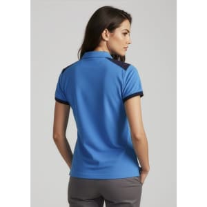 A blue women's polo shirt featuring a contrasting dark collar and sleeves, with a logo on the back.