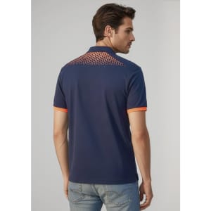 A men's short sleeve polo in navy blue with orange accents and a patterned design on the back. Features branding.