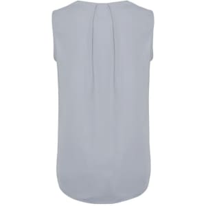 A pale blue sleeveless blouse with pleat detail at the back and a rounded hemline. It has a branding logo.
