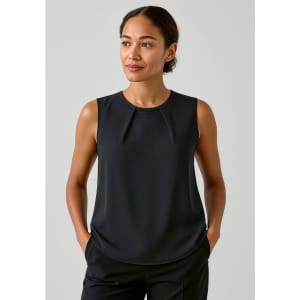 A sleeveless black blouse featuring pleat detail, styled with a simple round neckline.