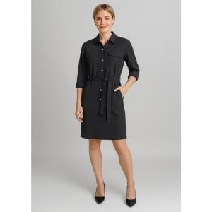A black shirt dress with a belted waist, button-down front, and two chest pockets displayed on a model.