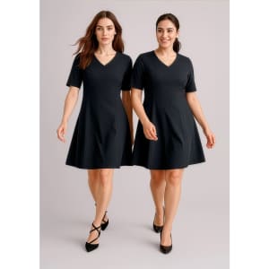 Two women wearing black extended short sleeve dresses, featuring a V-neck and a flared skirt. The dresses have a simple design.