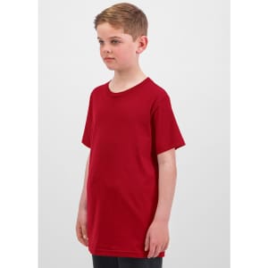 A red short sleeve tee for kids displayed on a child, featuring a simple design and a logo.